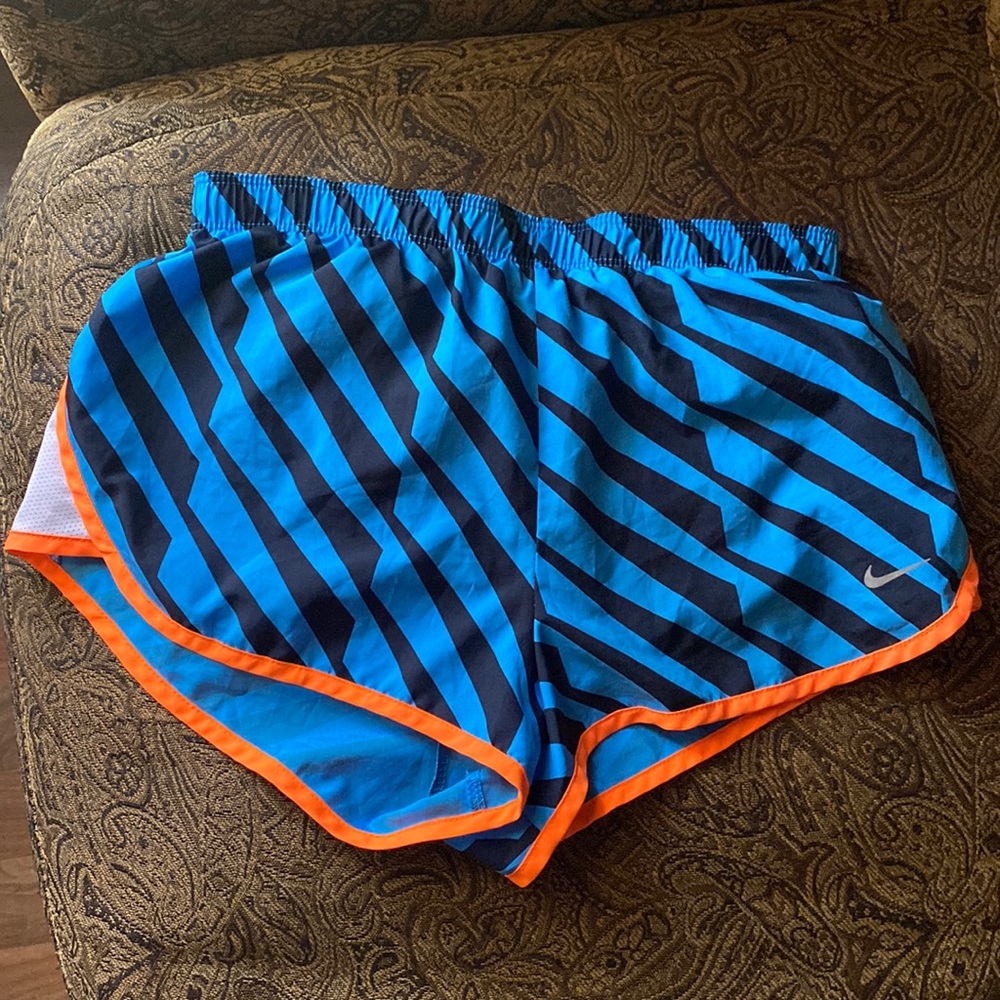 Nike baby blue and orange running shorts